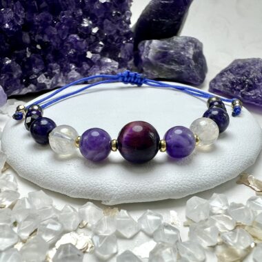 Bransoletka Transformacji i Mocy z kamieni fioletowych i złotych.